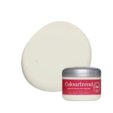 A jar of Colourtrend off white paint shown in front of a large, smooth, oval-shaped cream-colored swatch on a plain white background.